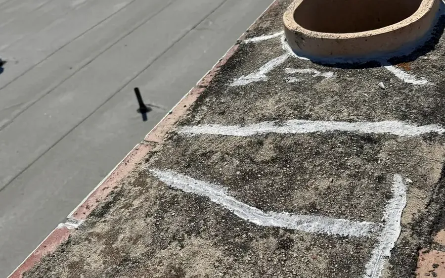 Gas fireplace vent termination on a roof